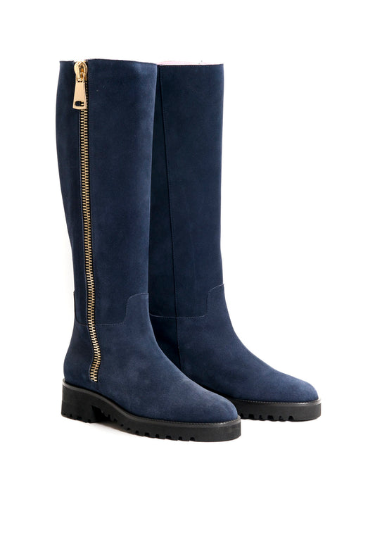 Dunkelblauer Stiefel mit goldenem Reißverschluss